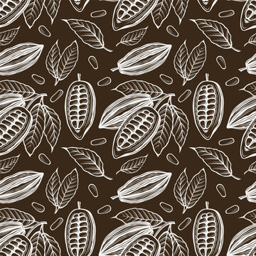 seamless pattern of cocoa beans, branch and leaves on brown background