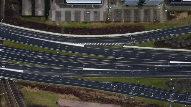 Amsterdam a10 intersection with the S102 top down aerial drone view. Traffic moving