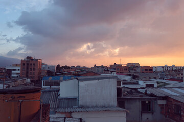 Beautiful colored dusk in bogota, colombia from a industrial and residential neighborhood.