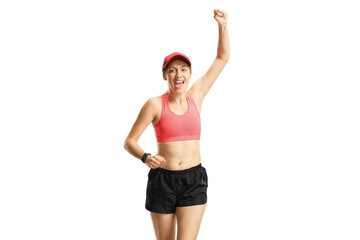 Woman running towards camera and gesturing happiness