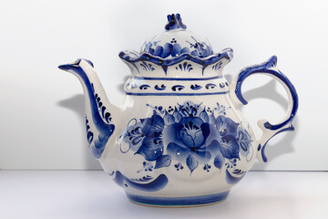 Porcelain Teapot for Brewing Tea decorated with an ornament in the traditional Russian style Gzhel