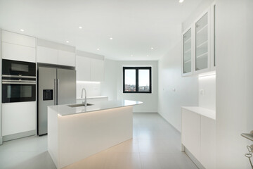Modern kitchen with white cabinets 