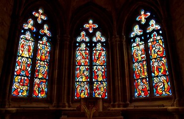 Beautiful stainglass inside the Treguier cathedral in Brittany. France - Powered by Adobe