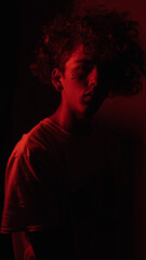 
portrait of curly man looking at camera