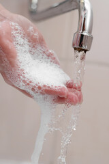 Fototapeta premium Hygiene. Cleaning Hands. Washing hands on sink.
