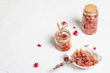 Homemade rose petals jam in bowl and glass jar