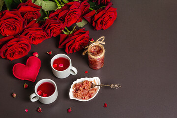 Tea time with rose petals jam and hot beverage