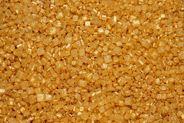 Golden sugar crystals background texture