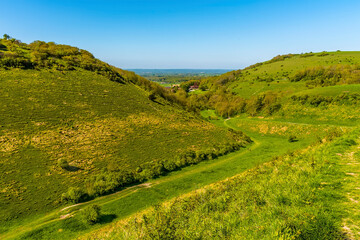 A view along a winding dry valley on the South Downs near Brighton in springtime