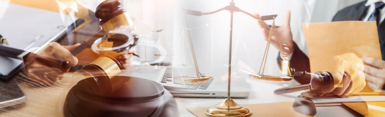 Business and lawyers discussing contract papers with brass scale on desk in office. Law, legal services, advice, justice and law concept picture with film grain effect