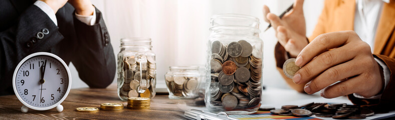 Healthcare costs and fees concept.Hand of smart doctor used a calculator for medical costs in modern hospital