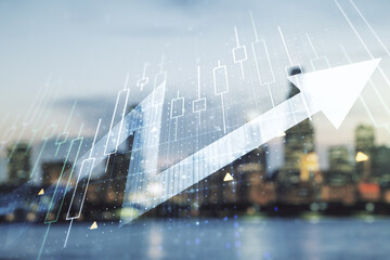 Abstract creative financial diagram and upward arrow hologram on blurry office buildings...