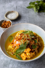 Indonesian laksa with prawns, bean sprouts and crispy shallots