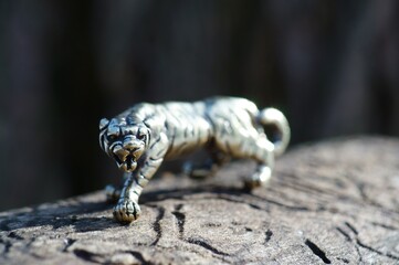 Metal tiger figurine close-up. Figurines close-up.