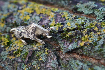 Metal bull figurine close-up. The symbol of 2021.