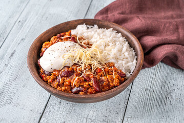 Chili con carne served with white rice