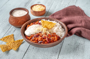 Chili con carne served with white rice