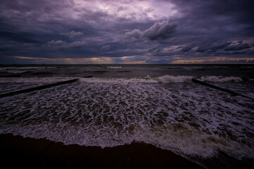 gloomy dark blue sky at sunset and dark raging baltic sea in Zelenogradsk Kaliningrad region