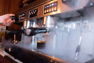 Coffee machine while preparing delicious coffee