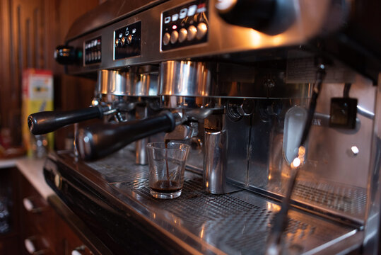 Coffee machine while preparing delicious coffee