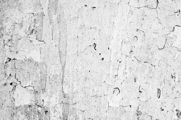 Texture of a concrete wall with cracks and scratches which can be used as a background