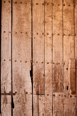 Traditional artisan entrance door made of wood in oldtown kasbah Morocco