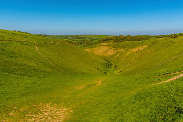 Obraz premium A view from the head of the longest dry valley in the UK on the South Downs near Brighton in springtime