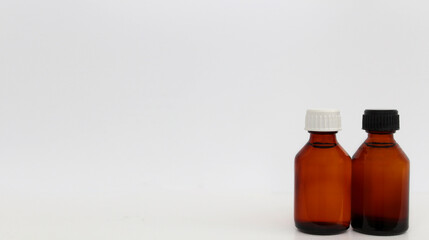 medicine bottles without label on white background