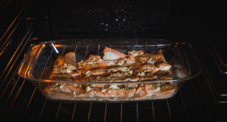 Fried salmon in the oven close-up