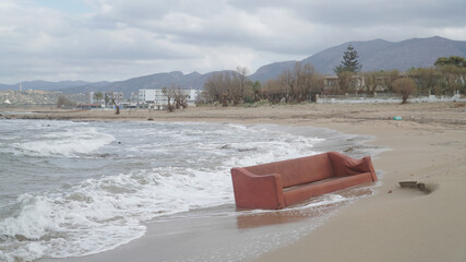 Malia Beach with washed up items after the big floodings on Crete Island in Greece.