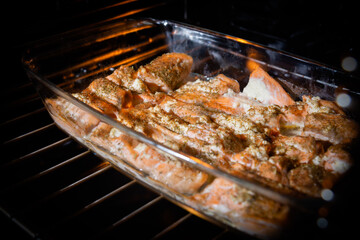 Fried salmon in the oven close-up