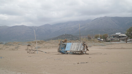 Fototapeta premium Malia Beach with washed up items after the big floodings on Crete Island in Greece.