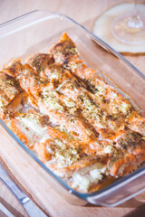 
pieces of baked salmon on a wooden table
