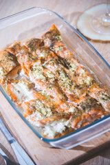 
pieces of baked salmon on a wooden table