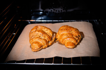 croissants in the oven close up. homemade sweets