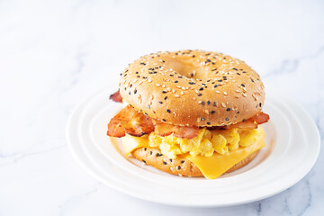 Fried bacon cheese egg salad  bagel
