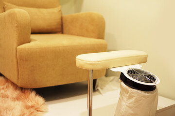 Nail saloon - Pedicure chair with footrest and fan. Cozy atmosphere in the beauty salon