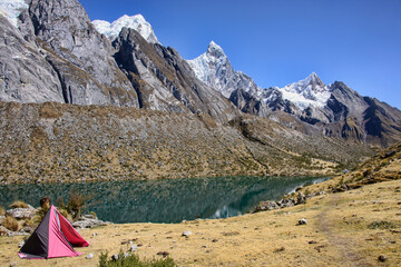 Camping near the Laguna Siula and mountain panorama on the Cordillera Huayhuash circuit, Ancash, Peru