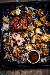 Honey dijon roasted turkey thighs with cauliflowers..