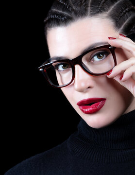 Stylish woman with trendy glasses and perfect makeup. Eye Care and Ophthalmology Concept