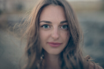 Obraz premium Beautiful girl posing on a summer evening
