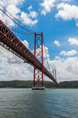Fototapeta na wymiar Picture of the famous bridge that cross the Tajo river in Lisbon, Portugal.