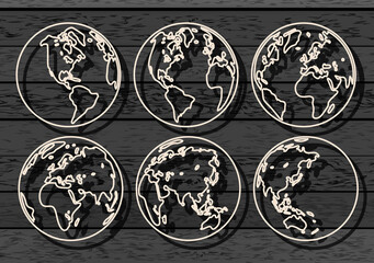 set of planet earth icons on a dark background. Wood background