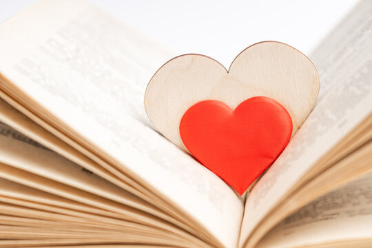 open book with heart symbol inside. love reading concept. valentine day greeting card conceptual