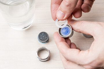 water faucet aerator after cleaning clogged using vinegar. handyman aerator repair