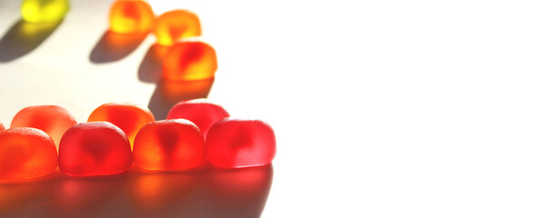 Blurred image of jelly candies. Abstract colorful food background