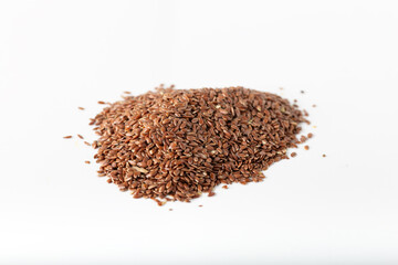 Flax seeds on white background.