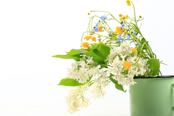 bouquet of spring wildflowers on a white background