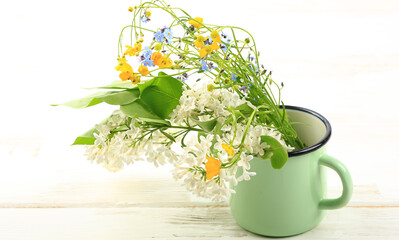 bouquet of spring wildflowers on a white background