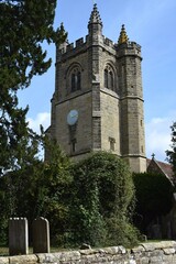 Fototapeta na wymiar Vertical photo of old parish church in Chiddingstone, Kent, England